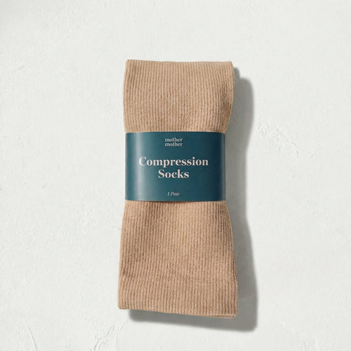 sand color compression socks on a white background