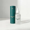 Mother Mother magnesium oil bottle and cylindrical container on a light gray background