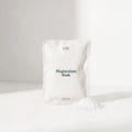 White bag labeled 'mother mother' with 'Magnesium Soak' on a white background